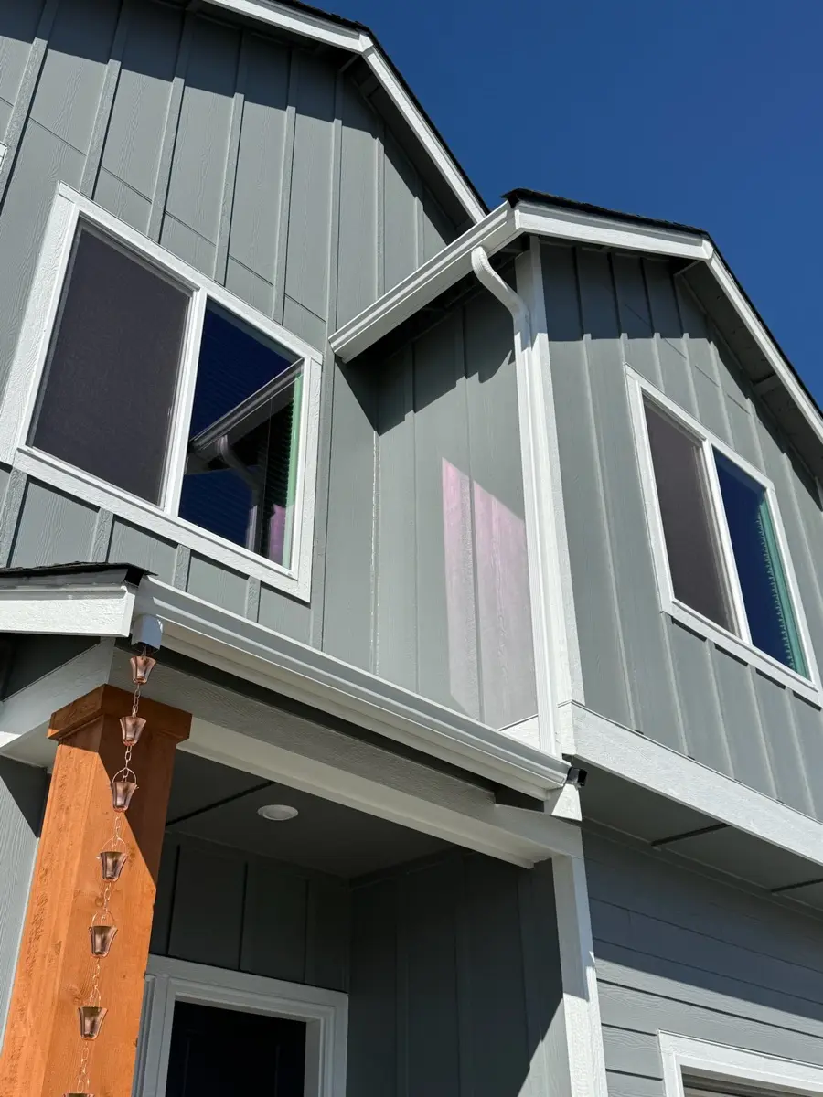 Seamless gutters on a board and batten home near Rathdrum