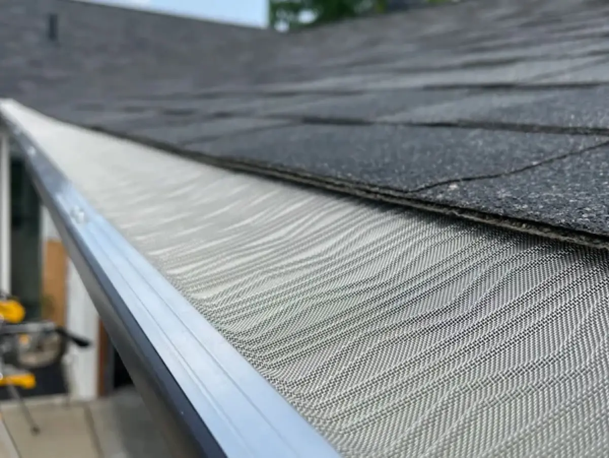 Micro-mesh gutter guard shedding pine needles